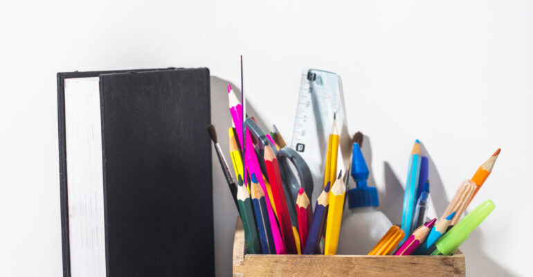 book-near-box-with-stationery