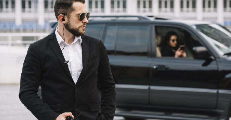 security-guard-protecting-client